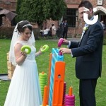 Giant Connect 4 at a wedding with the bride and groom having a game