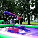 Two girls competing on the Gladiator Joust Hire