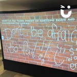 Digital Graffiti Wall at a corporate conference being used for feedback and advice