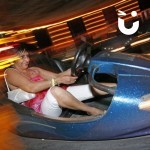 Dodgems Hire 2 at a fun day being used by a competitive woman