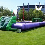 The Human Table Football Hire  during a university event in the sun