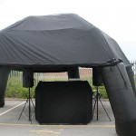 The Inflatable Canopy Hire  protecting the PA System from rain