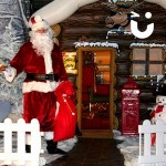 Santa welcoming guests into the Inflatable Santa's Grotto 