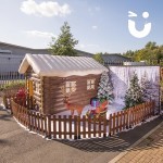Inflatable Santa's Grotto outside during a beautiful day