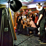 Group of guests posing for the Magic Selfie Mirror Hire