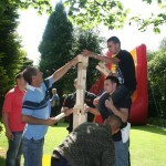 sitting on the shoulders to build the giant tower
