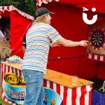 Prize Darts Stall Hire Fun Day being used at a Corporate Fun Day