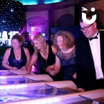 Guests enjoy the Roll A Ball Hire during an awards evening