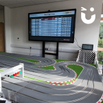 Our Scalextric course along side the lap times of the racers