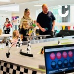 Scalextric Track Hire for a Corporate event with a family racing