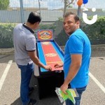 Shuffle Pucks Table Top Hire at a corporate fun day