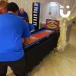 Shuffle Pucks Table Top Hire at a team building event