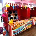 Ball In A Bucket Hire 6 set up inside an office with bunting displayed on roof