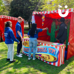 Students playing Cactus Toss at one of my Side Stalls