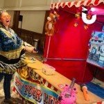 Cork Shoot Hire Image at an corporate party with a woman just missing out on a prize