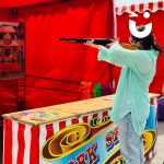 Event guest shooting on the Cork Shoot Side Stall