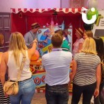 Ferris Wheel Hoopla stall at a corporate event with a crowd gathering to watch!