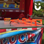 Toy crossbows set up on the counter in front of one of our Side Stalls