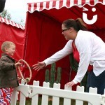 A young boy having a go on the Hoopla Stall Hire