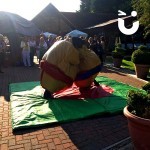 The Sumo Suits come with a mat to play on.