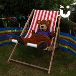 Sunshine Bear Hire chilling on our Deckchair Hire