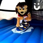 lion mascot on the surf simulator