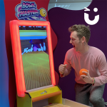 Ryan selebrating a strike on the virtual bowling
