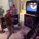 Virtual Reality Experience being enjoyed at a corporate party by an excited party goer