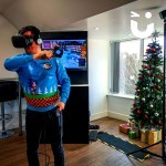 A guest fully embraces Christmas - with Sonic The Hedgehog Christmas jumper - and enjoys the challenge of the Virtual Reality hire for his office Christmas Party