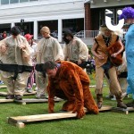 The Walk the Plank Challenge makes for a lot of fun at an It's a Knockout event, where teams are dressed in fancy dress, competing to win the day