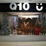 Santa's Wooden Grotto outside a clothing shop