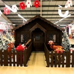 Santa's Wooden Grotto inside a clothing store