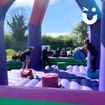 Inflatable Wrecking Ball Hire at a corporate fun afternoon with a competitive group of men