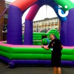 Fun Expert Alpas posing next to our Inflatable Wrecking Ball at a University event
