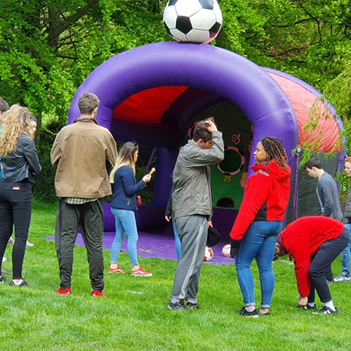 Students testing their skill on the Penalty Shootout Hire 