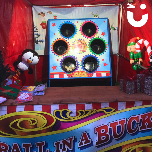 Snowball in a Bucket Side Stall set up with Christmas novelty prizes