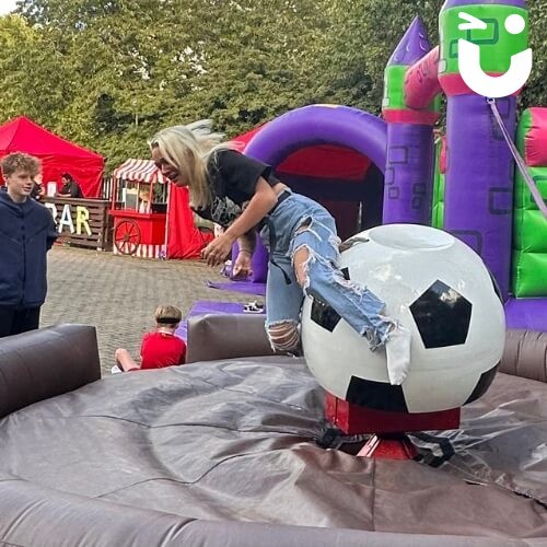 Rodeo Football Inflatable At A Corporate Family Fun Day