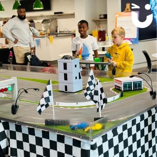 Scalextric Track Hire for a Corporate event with 2 young boys racing
