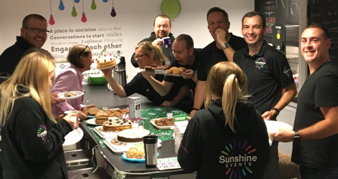 Fun Experts enjoying cakes in the office for Macmillan Coffee Morning