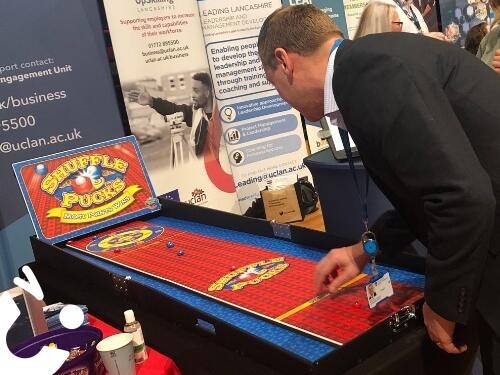 Shuffle Pucks Table Top Hire at a promotional exhibition