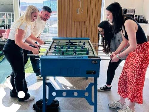 Table football being enjoyed at a corporate fun day